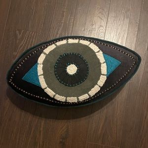 World Market teal & black evil eye gusseted throw pillow